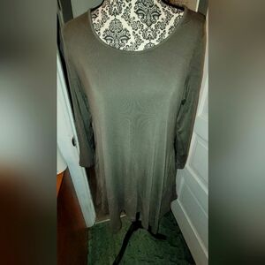 Green asymmetrical tunic, barely worn